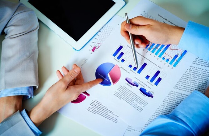 Conducting market research using data tables and pie charts