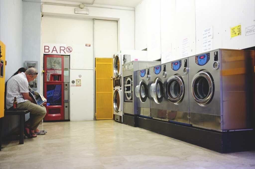 People waiting for laundromat in Laundry shop 