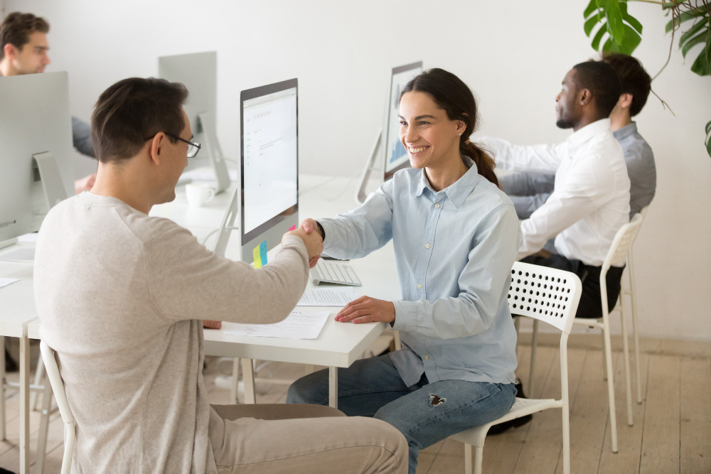 Customer shaking hands with each other